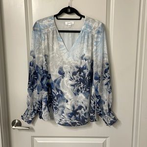 Sheer Calvin Klein blouse. Perfect for the office!
